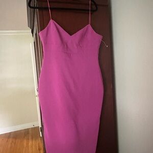 Likely size 6 body hugging dress. Brandnew with tags never worn.